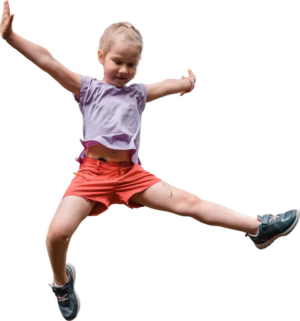 Child jumping joyfully in motion